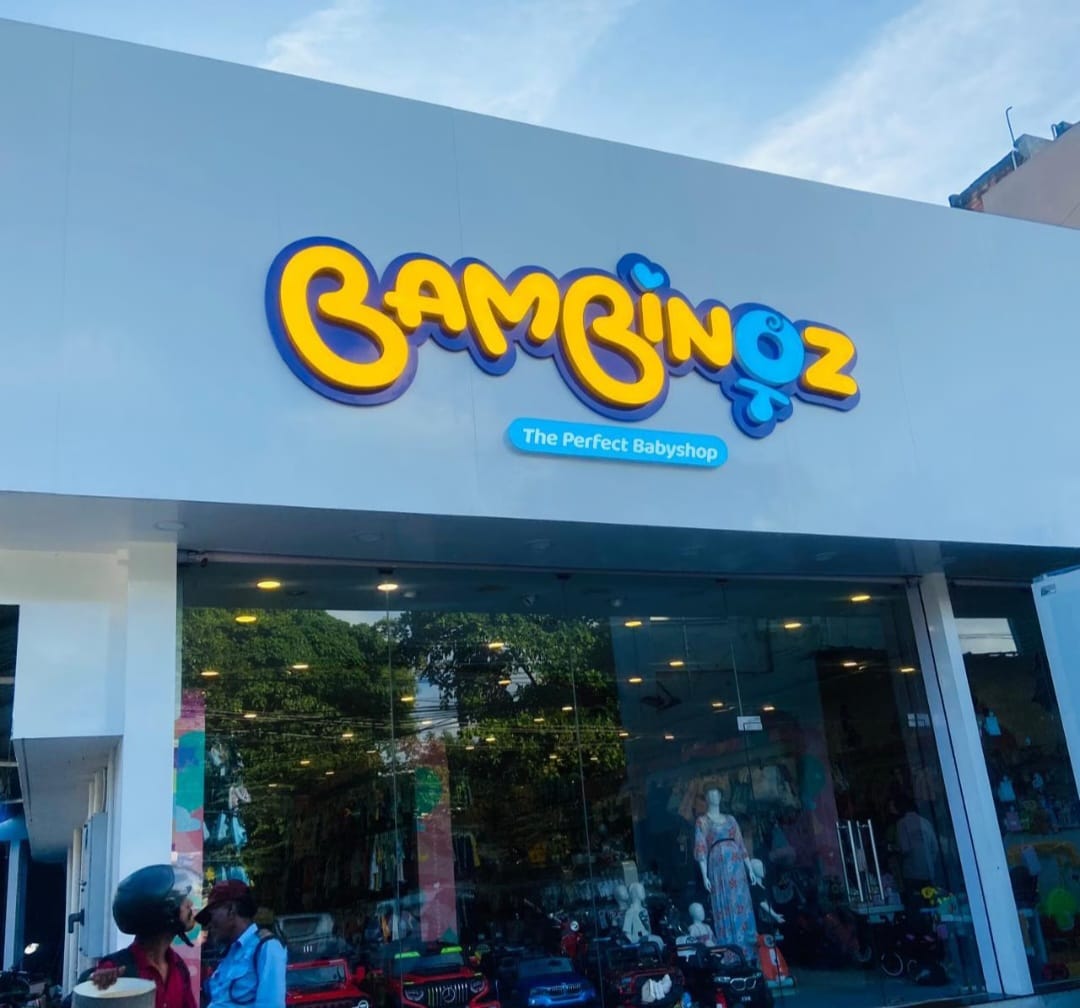 Modern baby shop interior with pastel colors and organized displays